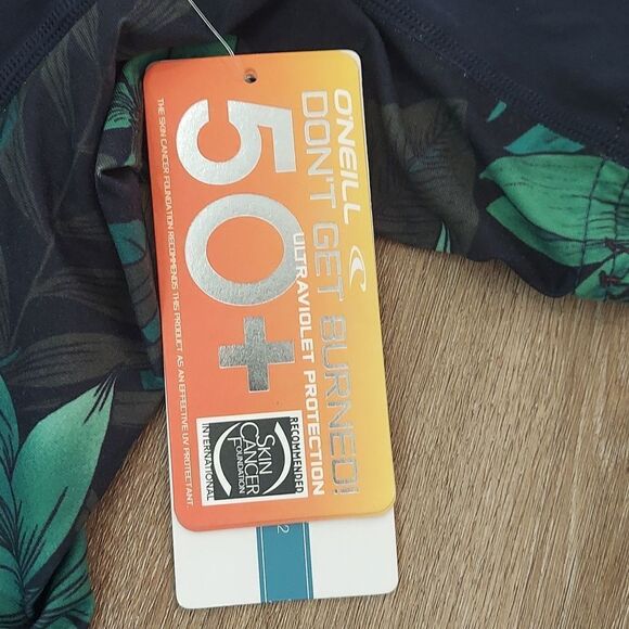 O'Neill 50+ UV Protection Blue Side Floral Print Short Sleeve Rash Guard Med NWT - Picture 5 of 7